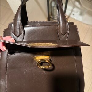 Salvatore Ferragamo dark brown purse.
